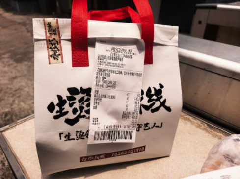 �����¹桰ʳ����ǩ��ʩ�У����͵���������ǩ����